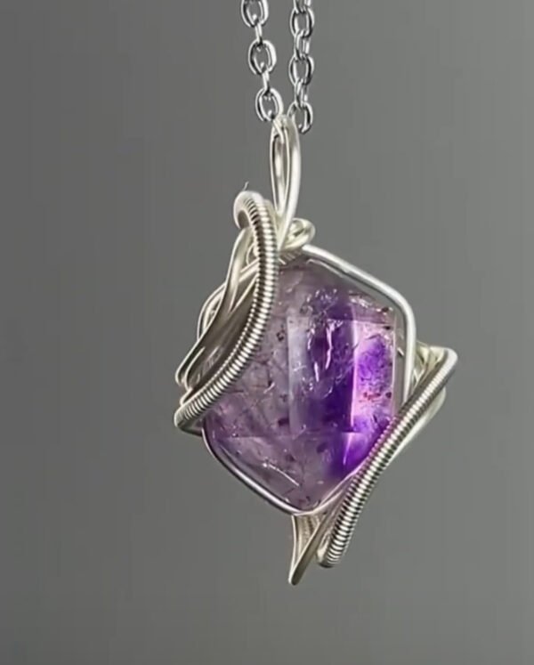 Amethyst double pointed metal wound necklace